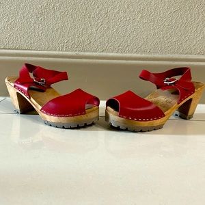 Red clogs with strap